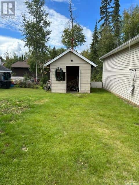 711 Waskos DRIVE — Northern Admin District, Saskatchewan - Photo 5 of 31