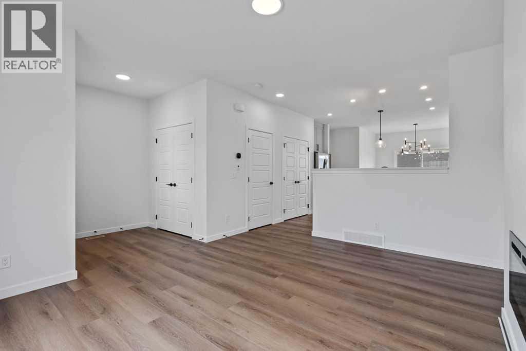 1029 Reynolds Crescent SW — Airdrie - Photo 5 of 28