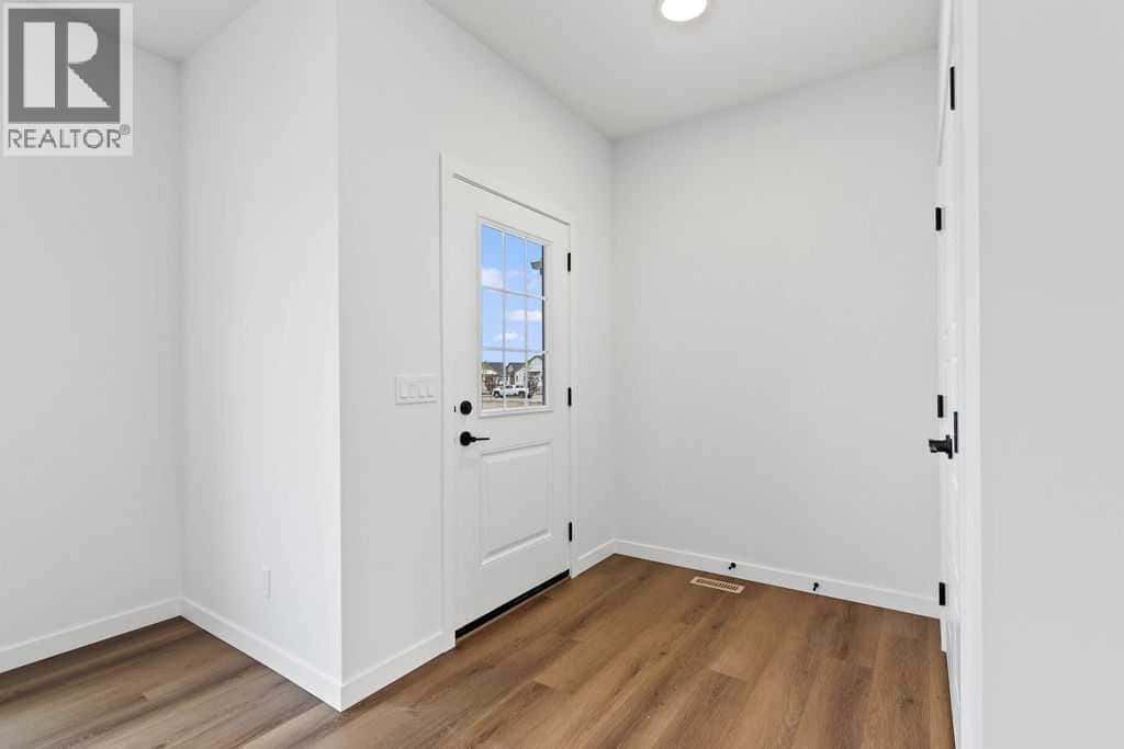 1029 Reynolds Crescent SW — Airdrie - Photo 3 of 28