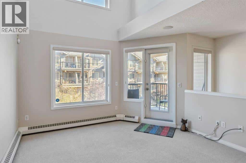 229 Mckenzie Towne Lane SE — Calgary - Photo 3 of 24