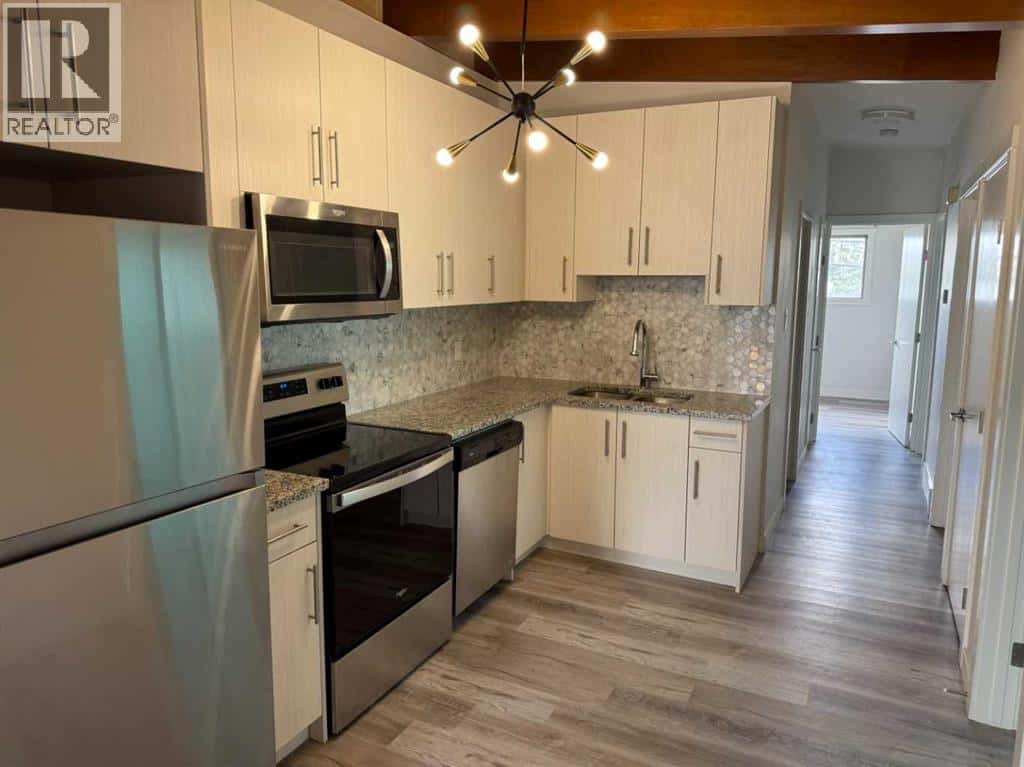 4704 14 Street NW — Calgary - Photo 3 of 7