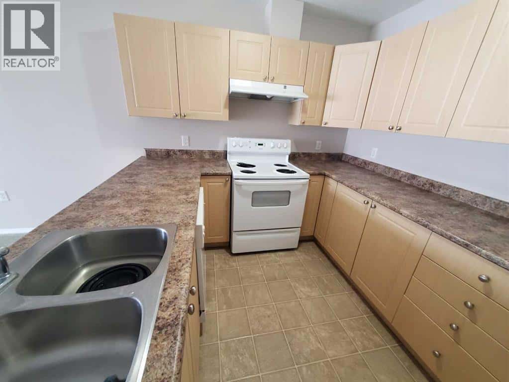 411, 1615 41 Street — Edson - Photo 2 of 6