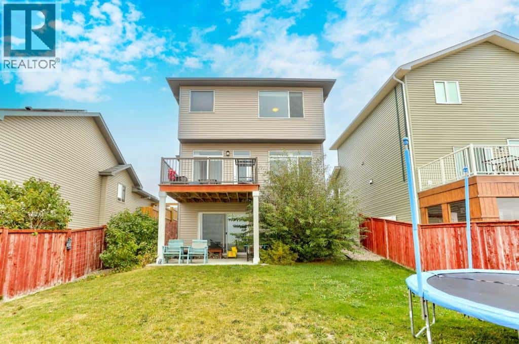 60 Alma Isobell Hodder Crescent N — Lethbridge - Photo 4 of 36