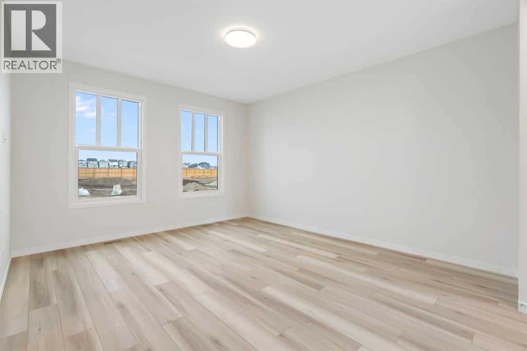 680 Buffaloberry Manor SE — Calgary - Photo 2 of 38