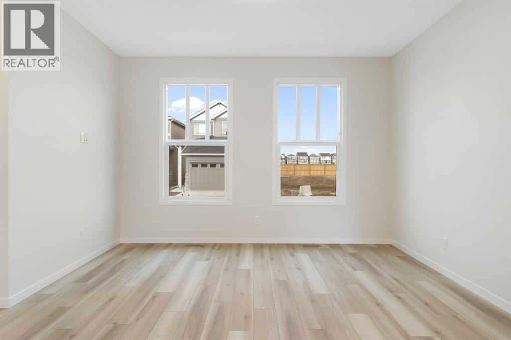 680 Buffaloberry Manor SE — Calgary - Photo 3 of 38