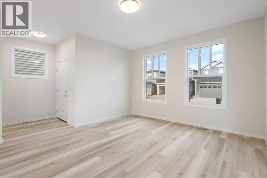 680 Buffaloberry Manor SE — Calgary - Photo 4 of 38