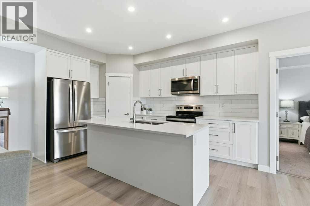 1107, 100 Banister Drive — Okotoks - Photo 3 of 40