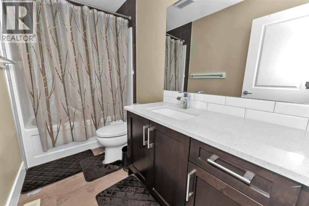 7432 Ogden Road SE — Calgary - Photo 2 of 44