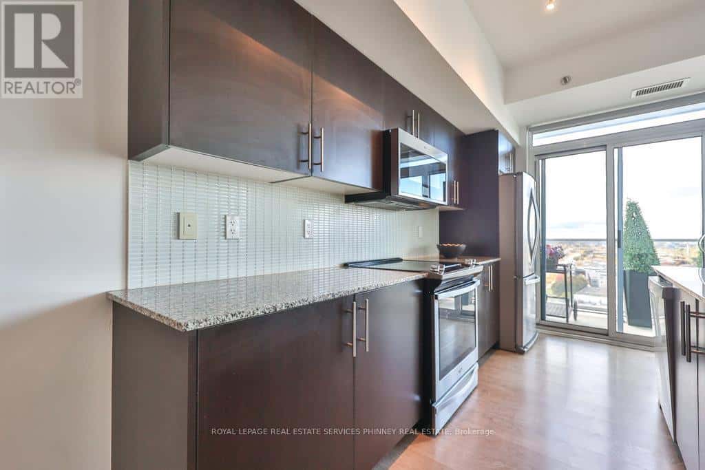 1709 - 55 SPEERS ROAD — Oakville (QE Queen Elizabeth) - Photo 4 of 36