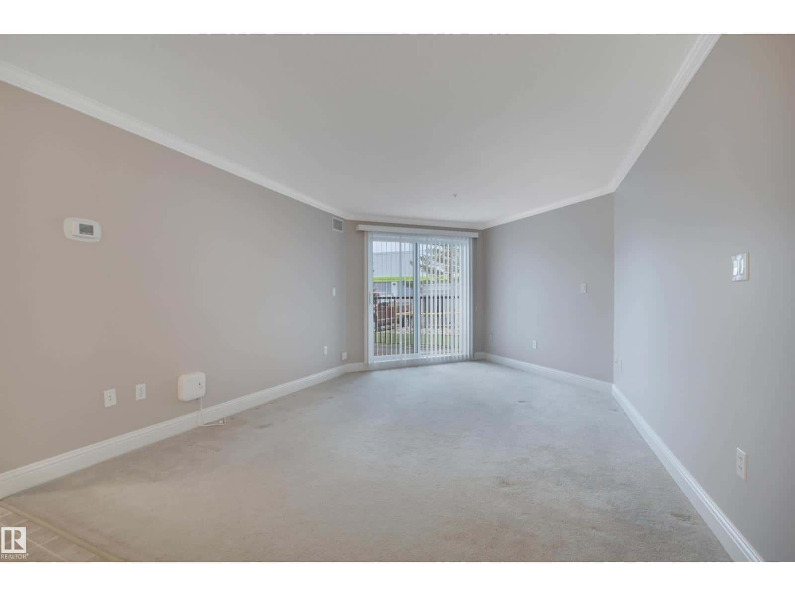 #121 13005 140 AV NW — Edmonton - Photo 4 of 38