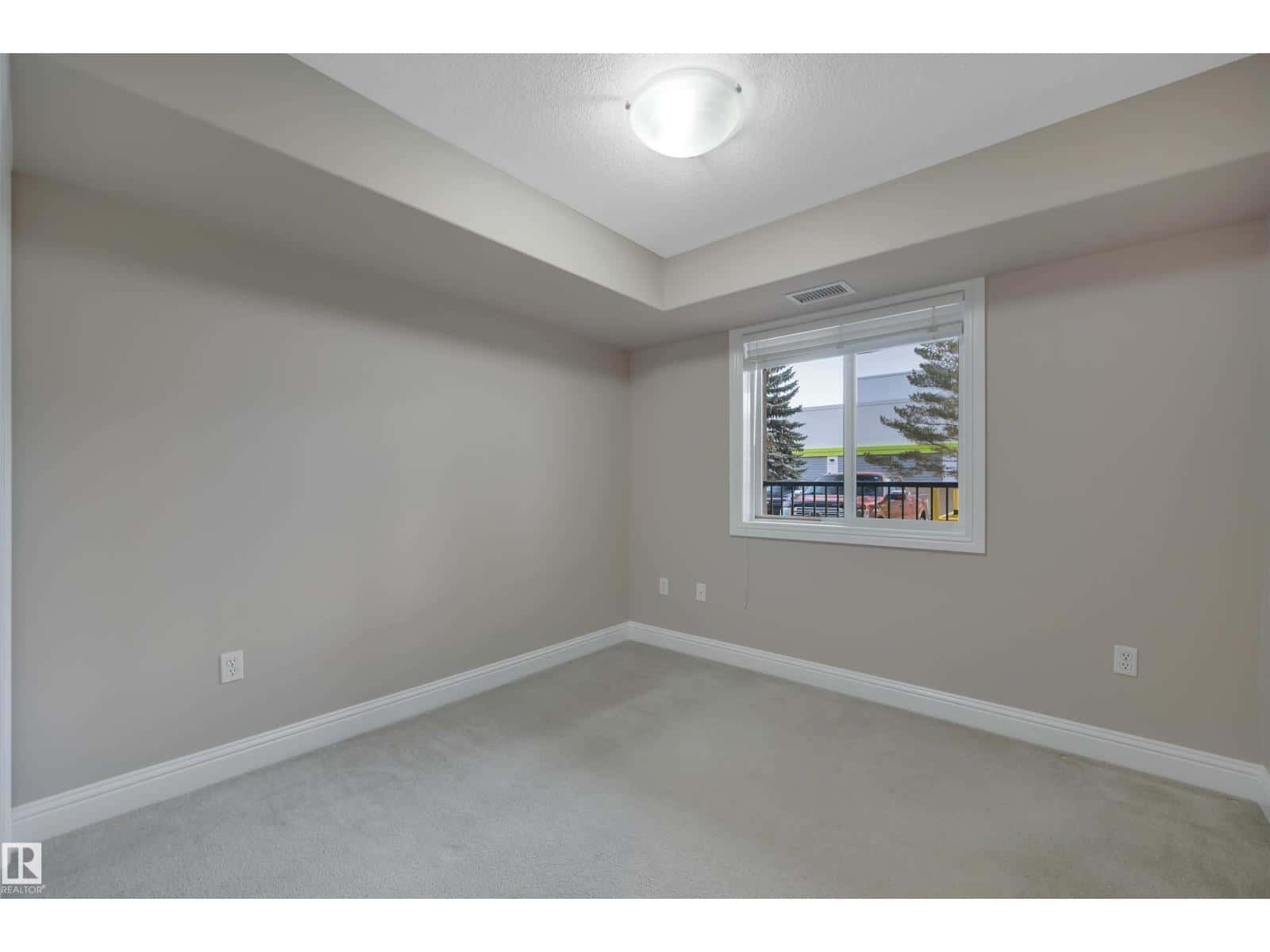 #121 13005 140 AV NW — Edmonton - Photo 3 of 38