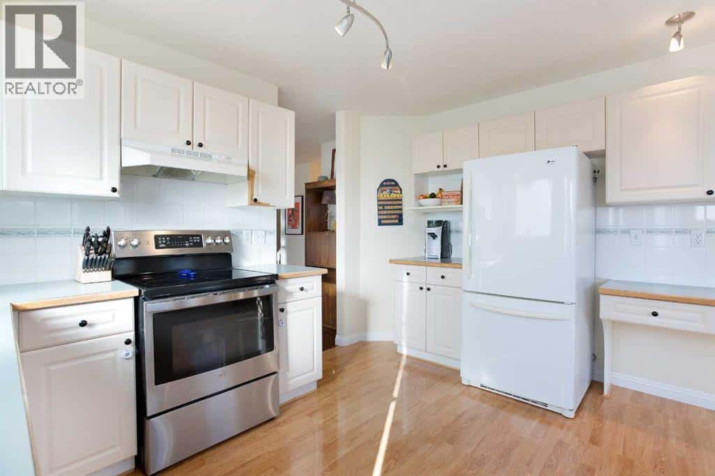 214 Canals Boulevard SW — Airdrie - Photo 4 of 50