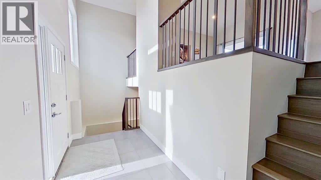 130 Riverwood Crescent SW — Diamond Valley - Photo 2 of 39