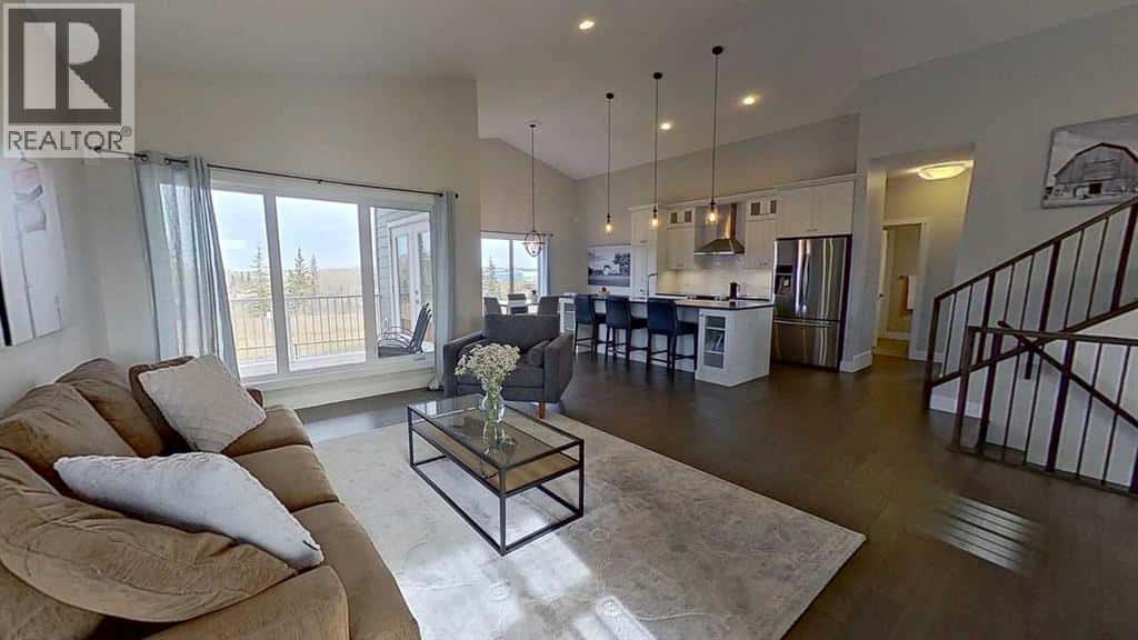 130 Riverwood Crescent SW — Diamond Valley - Photo 4 of 39