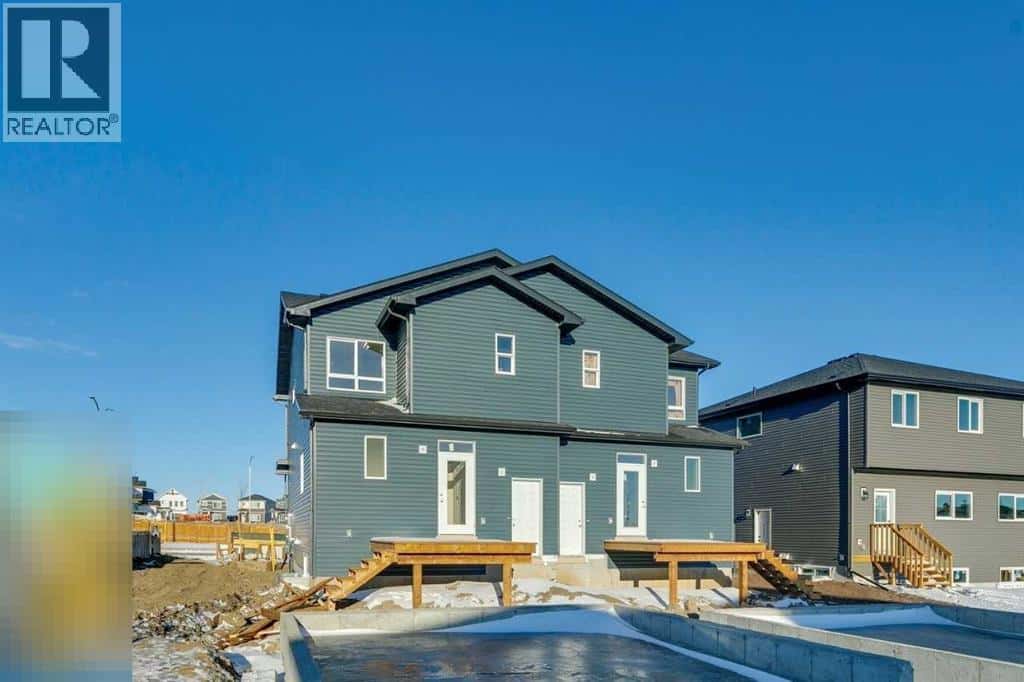 121 Bridgeport Gate N — Chestermere - Photo 3 of 5