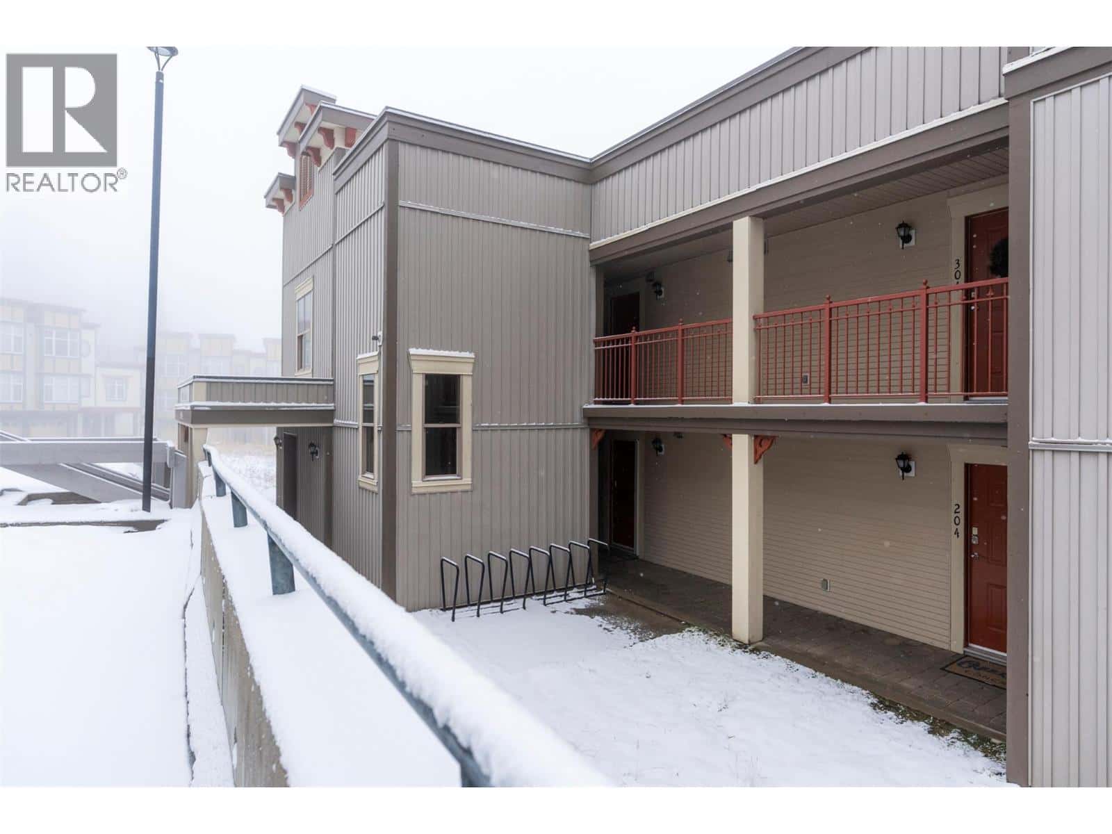 9804 Silver Star Road Unit# 203 — Vernon - Photo 5 of 31