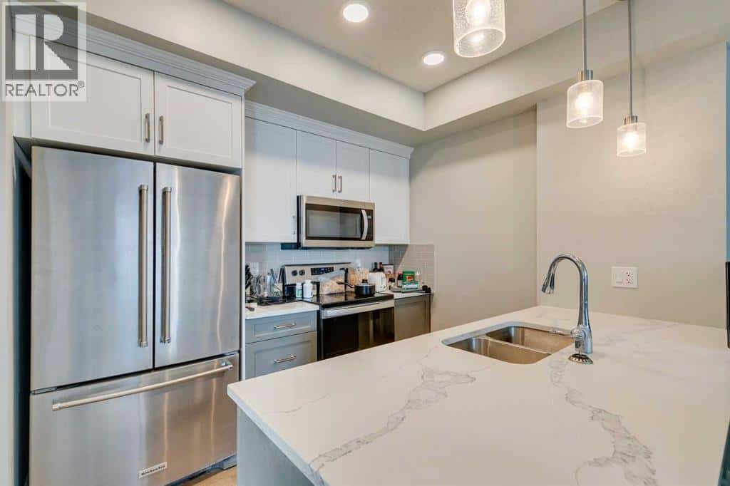 306, 19661 40 Street SE — Calgary - Photo 5 of 23