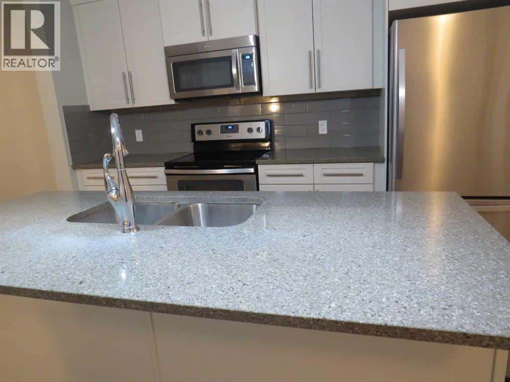 309 Evansridge Park NW — Calgary - Photo 4 of 23