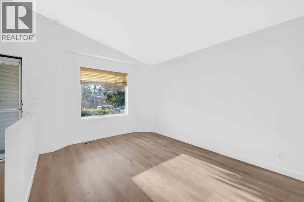 16218 Shawbrooke Road SW — Calgary - Photo 5 of 41