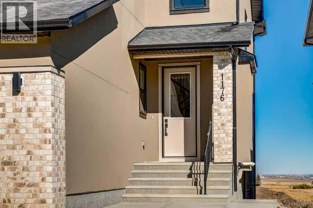 1176 Iron Ridge Avenue — Crossfield, Alberta - Photo 3 of 50