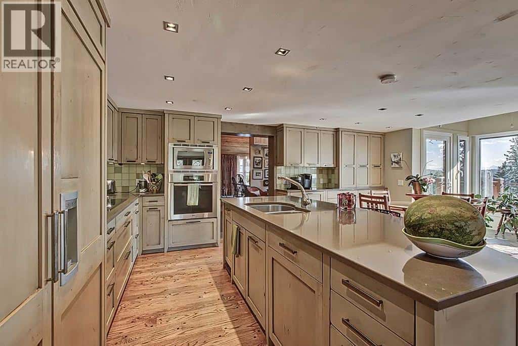 242075 1280 Drive W — Rural Foothills County, Alberta - Photo 4 of 50