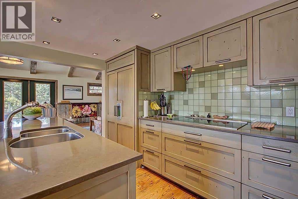 242075 1280 Drive W — Rural Foothills County, Alberta - Photo 2 of 50