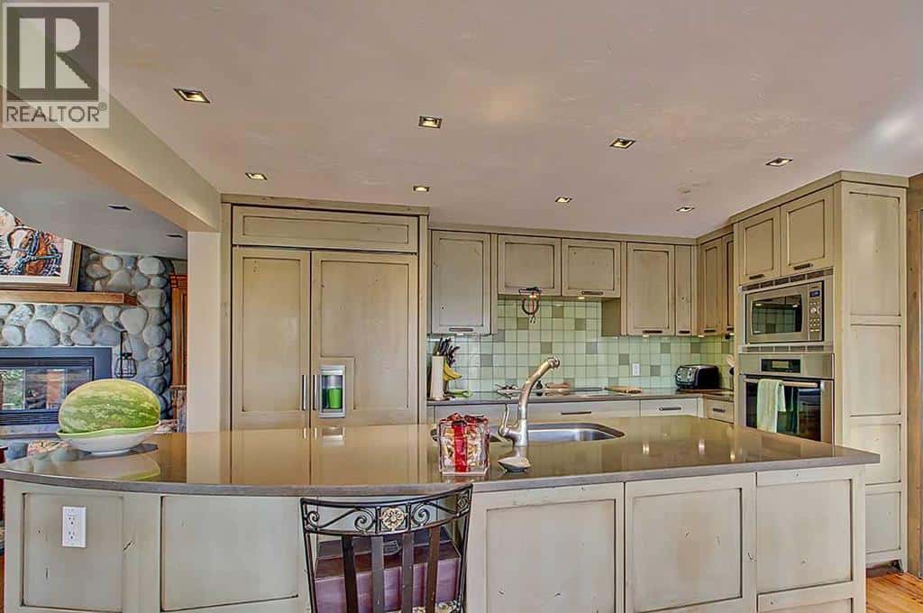 242075 1280 Drive W — Rural Foothills County, Alberta - Photo 3 of 50